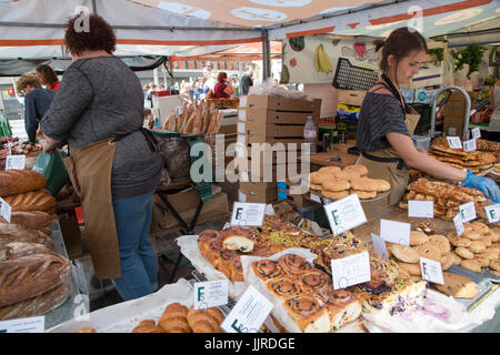 Market traders at King's Cross Real Food Market Stock Photo