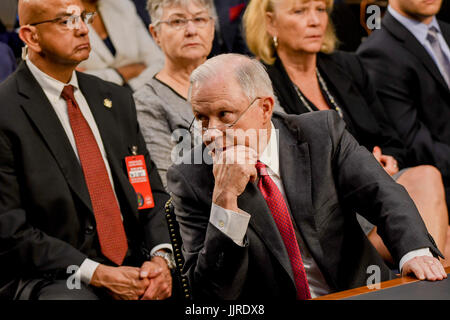 US. Attorney General Jeff Sessions talks with one of his aids prior the start of his testimony  in front of the Senate Intelligence Committee. Washington DC, June 13, 2017. Stock Photo