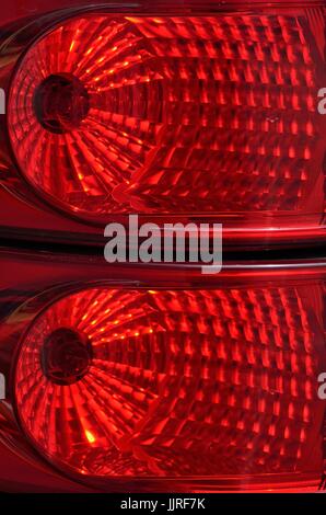 Back, tail or rear lights (close up) on a large Volvo bus. Stock Photo