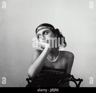 Model poses as a young woman in the 1920s Stock Photo