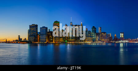 Brooklyn Bridge Park with Sunset and NYC Skyline Stock Photo