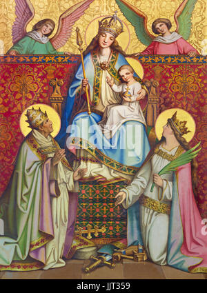 KREMNICA, SLOVAKIA - JULY 16, 2017: The neo-gothic painting of on the wood (Madonna, St. Catherine and St. Clement) from side altar of St. Catharine o Stock Photo