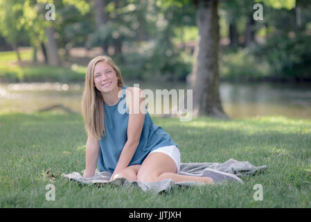 Fresh faced teenage girl outdoors Stock Photo