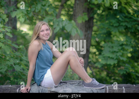 Fresh faced teenage girl outdoors Stock Photo