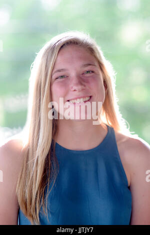 Fresh faced teenage girl outdoors Stock Photo