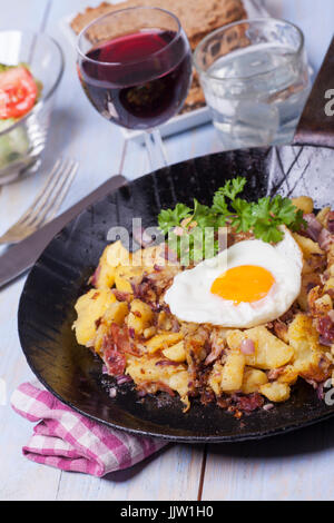 Tiroler Grostl, fried potatoes , bacon and onion. Austrian national ...