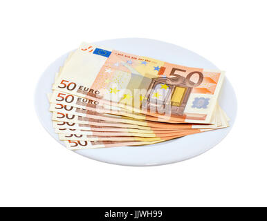 A bunch of money on a white plate isolated on white background Stock Photo