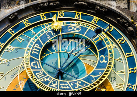 Old medieval astronomical clock (Orloj) in Prague on the Old Town Square. Colourful low angle view. Stock Photo