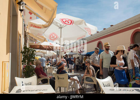 a alley with the Saturday Market in the old town of Loule at the Algarve of Portugal in Europe. Stock Photo