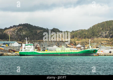MONGSTAD, NORWAY - APRIL 22, 2017: Cargo ship Saffier at the gravel production site near Mongstad, Norway. Stock Photo