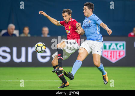 Houston, TX, USA. 20th July, 2017. Manchester United defender Matteo Darmian (36) keeps the ball away from Manchester City midfielder Samir Nasri (22) during the 2nd half of an International Champions Cup soccer match between Manchester United and Manchester City at NRG Stadium in Houston, TX. Manchester United won the match 2-0.Trask Smith/CSM/Alamy Live News Stock Photo