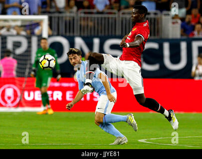 Houston, USA. 20th July, 2017. Paul Pogba (R) of Manchester United controls the ball during the International Champions Cup soccer match between Manchester United and Manchester City at NRG Stadium in Houston, the United States, on July 20, 2017. Manchester United won 2-0. Credit: Song Qiong/Xinhua/Alamy Live News
