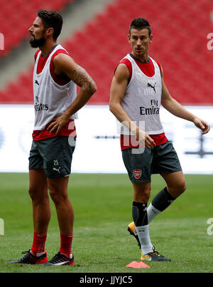 Beijing, China. 21st July, 2017. Laurent Koscielny (R) and Olivier Giroud of Arsenal look on during a training session for the pre-season soccer match between Arsenal and Chelsea at National Stadium in Beijing, capital of China, on July 21, 2017.  Credit: Wang Lili/Xinhua/Alamy Live News Stock Photo