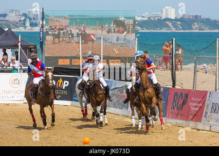 Action at the British Beach Polo Championships at Sandbanks beach, Poole, Dorset UK in July on a warm hot sunny day. Stock Photo