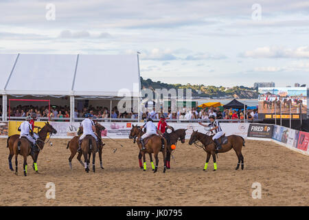 Action at the British Beach Polo Championships at Sandbanks beach, Poole, Dorset UK in July on a warm hot sunny day. Stock Photo