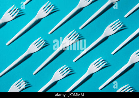 top view of set of plastic forks isolated on blue Stock Photo