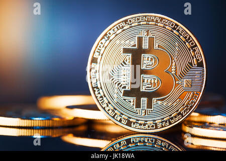 Golden Bitcoins. New virtual money. Studio shot Stock Photo