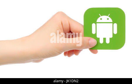Kiev, Ukraine - May 17, 2016: Hand holds Android icon printed on paper Stock Photo