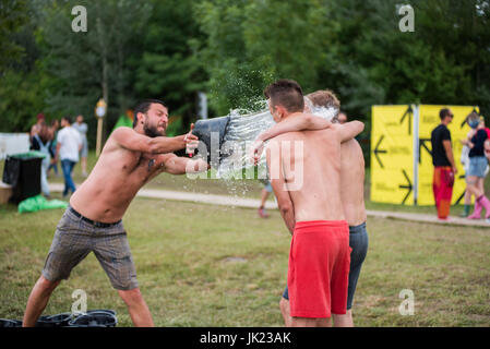 Outdoor shower and cold water bucket in a spa Stock Photo - Alamy