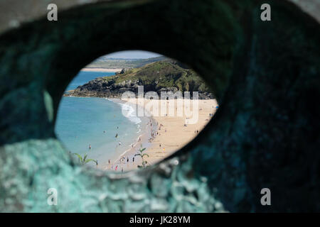 Looking through a Barbara Hepworth sculpture on public display overlooking Porthminster beach, St Ives, Cornwall Stock Photo