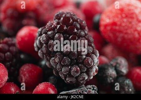 Mixed colorful frozen fruit Stock Photo