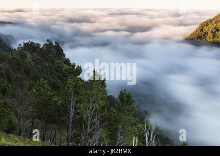 Fast moving clouds over the forge of Madeira Stock Photo