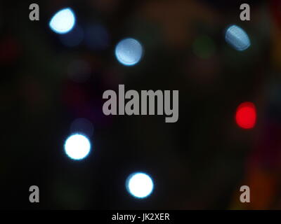 Six colorful, white, blue and red rounds abstract lights on black background Stock Photo
