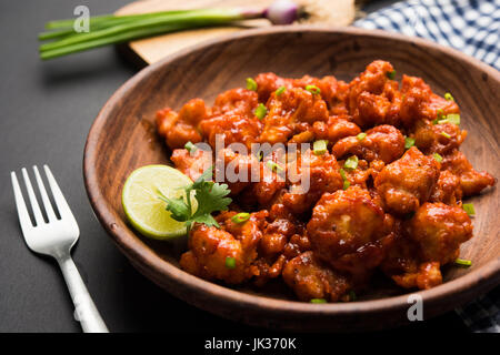 Gobi Manchurian dry - Popular street food of India made of cauliflower florets, selective focus Stock Photo