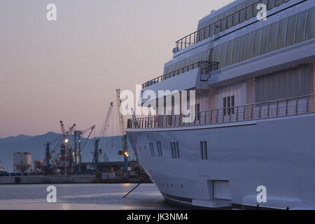 Italy, Sardinia, Cagliari, yacht by the Stazione Maritima, dusk Stock Photo