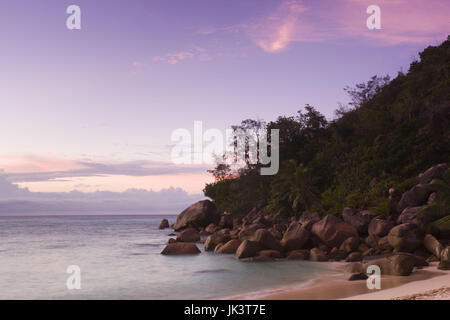 Seychelles, Praslin Island, Petite Anse Kerlan beach, sunset Stock Photo
