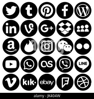 Kiev, Ukraine - April 27, 2017: Collection of popular black round social media icons, printed on paper: Facebook, Twitter, Google Plus, Instagram, Pin Stock Photo