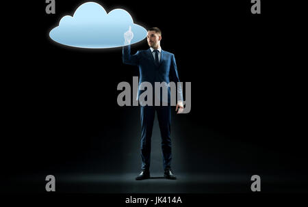 businessman touching virtual cloud hologram Stock Photo