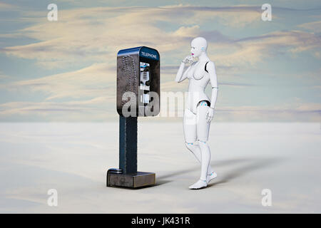Curious robot woman examining pay telephone Stock Photo