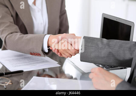 Business handshake. Two women lawyers are shaking hands after meeting or negotiation Stock Photo