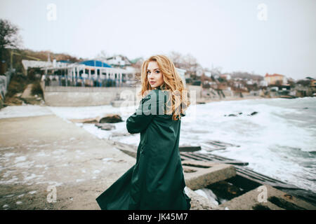 Portrait of serious Caucasian woman on beach Stock Photo