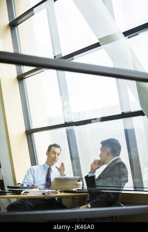 Businessmen talking in meeting Stock Photo