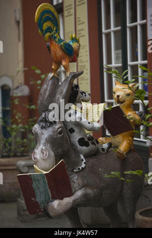 Germany, State of Bremen, Bremen, Schnoor waterfront area, Town Musicians of Bremen sculpture, Stock Photo