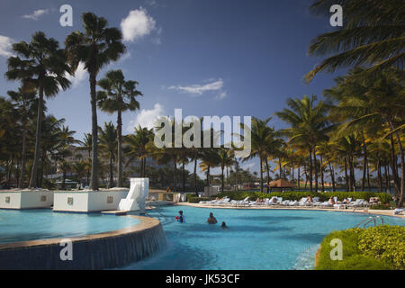 Puerto Rico, San Juan, swimming pool view at the Caribe Hilton Hotel Stock Photo
