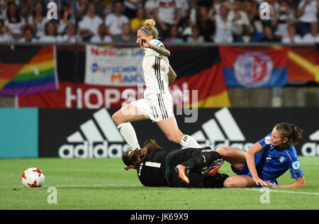 Germany's Anja Mittag (L) is fouled ba Italy's goalkeeper Laura Giuliani (C) during the women's European Soccer Championships group B match between Germany and Italy at the Koning Willem II Stadium in Tilburg, the Netherlands, 21 July 2017. Photo: Carmen Jaspersen/dpa Stock Photo