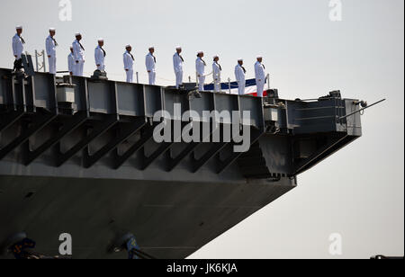 Norfolk, USA. 22nd July, 2017. Sailors stand on USS Gerald R. Ford during its commissioning ceremony at Naval Station Norfolk, Virginia, the United States, on July 22, 2017. The U.S. Navy commissioned United States Ship (USS) Gerald R. Ford, the newest and most advanced aircraft carrier, at Naval Station Norfolk, a navy base in Virginia on Saturday. Credit: Yin Bogu/Xinhua/Alamy Live News Stock Photo