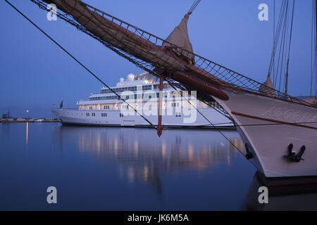 Italy, Sardinia, Cagliari, yacht by the Stazione Maritima, dawn Stock Photo