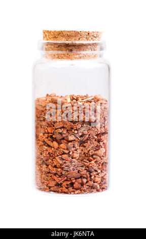 Root of Rubia Tinctorum in a bottle with cork stopper for medica Stock Photo