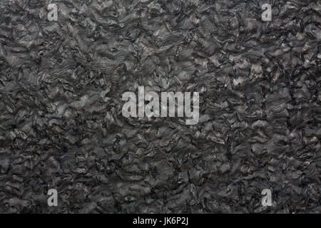Black granite texture on macro. Stock Photo