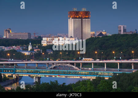 Russia, Moscow Oblast, Moscow, Sparrow Hills-area, elevated city view with the Russian Academy of Sciences, RAN, building, dusk Stock Photo