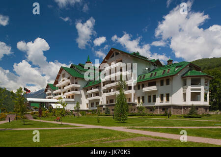 Russia, Caucasus Mountains, Sochi Area, Krasnaya Polyana, Gazprom Ski Resort, Grand Hotel Polyana, exterior, summer Stock Photo