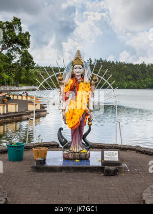 Grand Bassin, Mauritius - December 26, 2017: Statue of an indian (hindu, buddhist) divinity in a hindu temple (Grand Basin) in Mauritius. Stock Photo