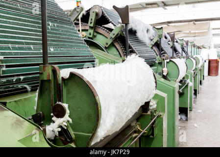Features of carding machine in textile mill Stock Photo