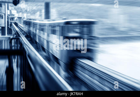 light rail moving on railway in chongqing Stock Photo