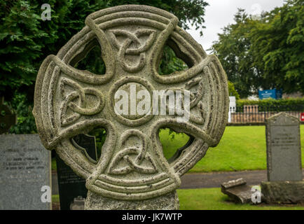 Close up of celtic style cross on gravestone in churchyard, St Mary's Collegiate Church, Haddington, East Lothian, Scotland, UK Stock Photo
