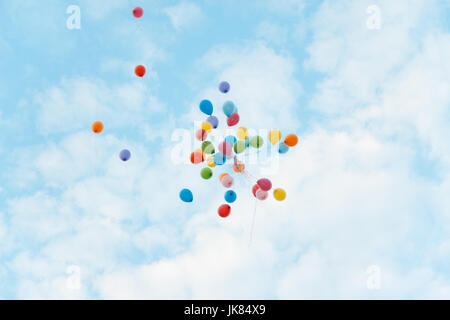 Many flying colorful balloons in the sky Stock Photo